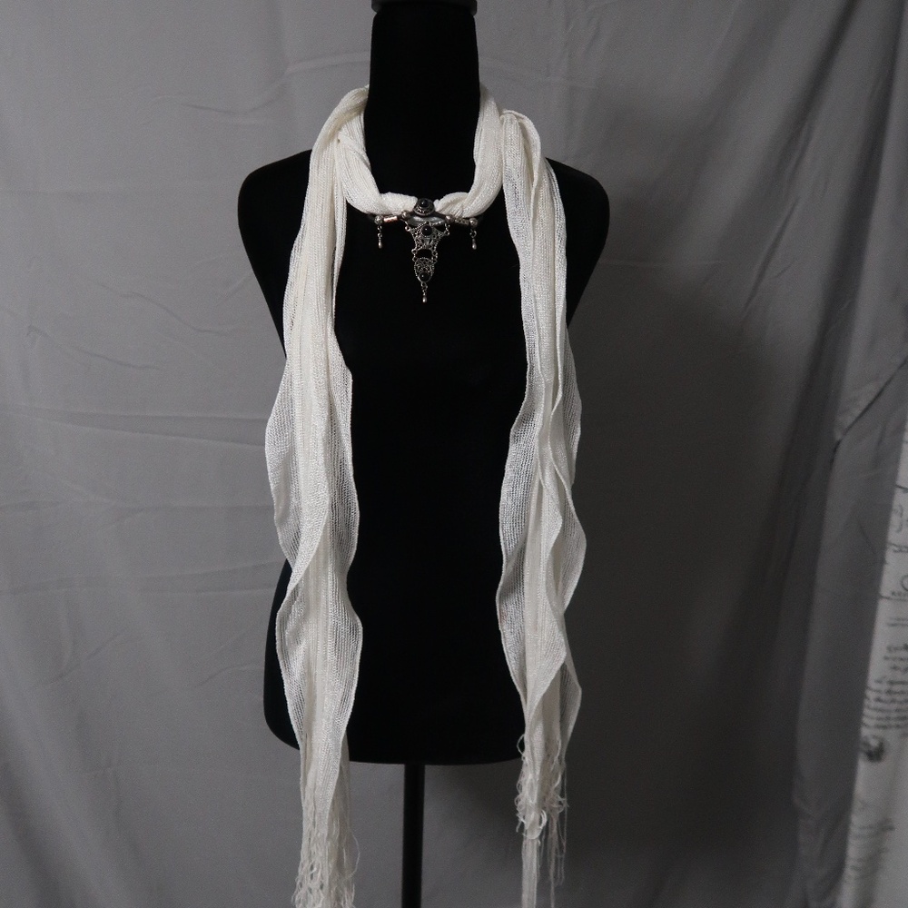 White scarf with pendent